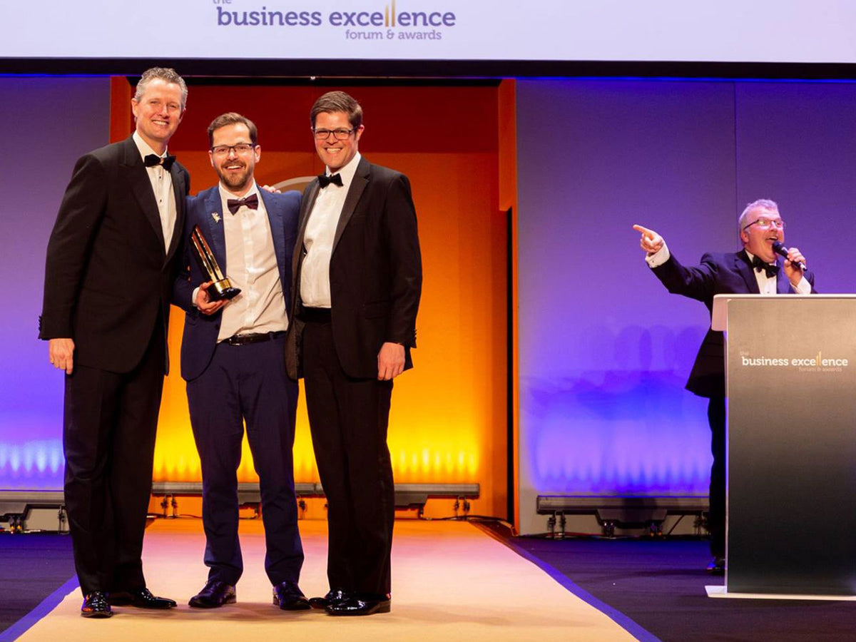 Rik Cridland with Brad Sugars and Sean Purcell at the ActionCOACH Business Excellence Awards 2019