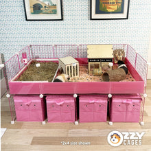 Load image into Gallery viewer, Pink 2x4 Ozzy Cages C&amp;C Guinea Pig Enclosure with clear sides, pink grids, a stand and storage boxes. Also features an Ozzy Kitchenette litter tray. Two guinea pigs play inside with enrichment toys, tunnels and hides. 
